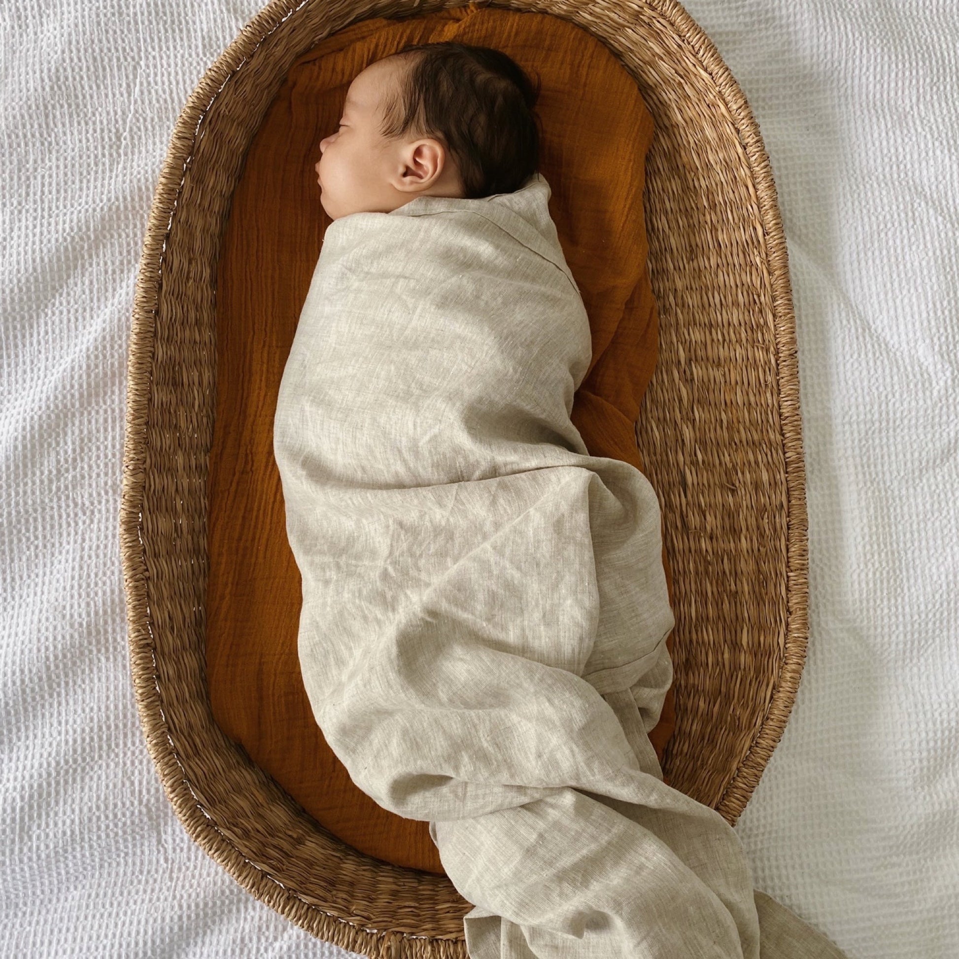gorgeous baby in natural hemp swaddle